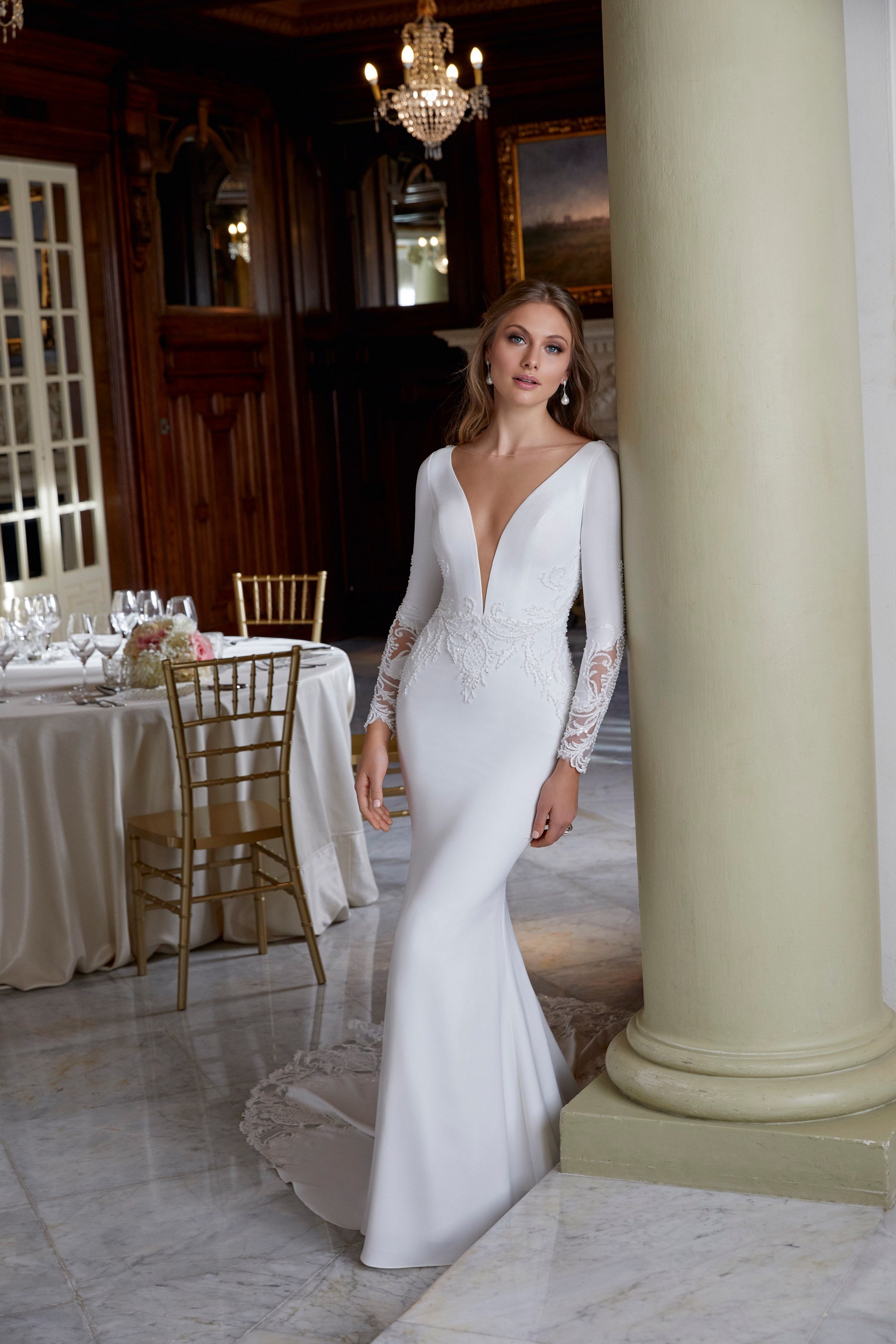 Ronald Joyce 69573 wedding dress with a deep plunging v-neckline